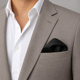 The Black Matter pocket square — light jacket · wearing detail.