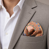 The Colour Trip pocket square — light jacket · wearing detail.