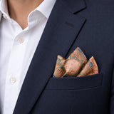 The Colour Trip pocket square — navy jacket · alternate fold.