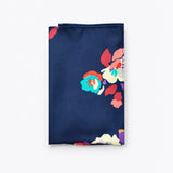The Deep Blue Floral pocket square — folded product.