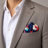 The Deep Blue Floral pocket square — light jacket · wearing detail.