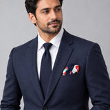 The Deep Blue Floral pocket square — formal model · navy and tie.