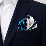 Turkish Floral pocket square — navy jacket · alternate fold.