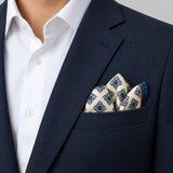 Ukrainian Folk Art pocket square — navy jacket · alternate fold.