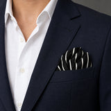 White Cane Crow pocket square — navy jacket · wearing detail.