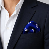 White Conifer pocket square — navy jacket · wearing detail.