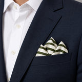 White & Green Stripes pocket square — navy jacket · alternate fold.