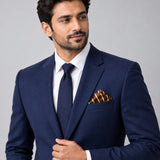 Yellow Cane Hazel pocket square — formal model · navy and tie.